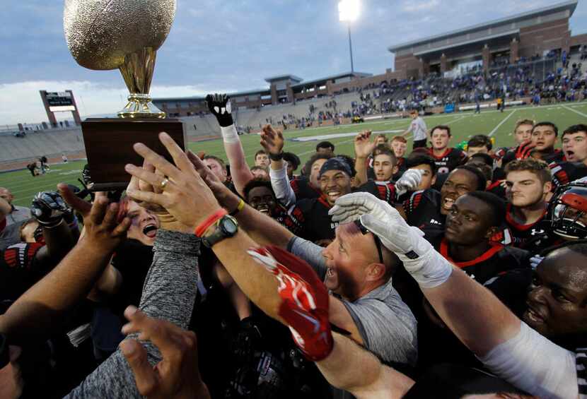 FILE - Mansfield Legacy head coach Chris Melson keeps his eyes on the prize during the...