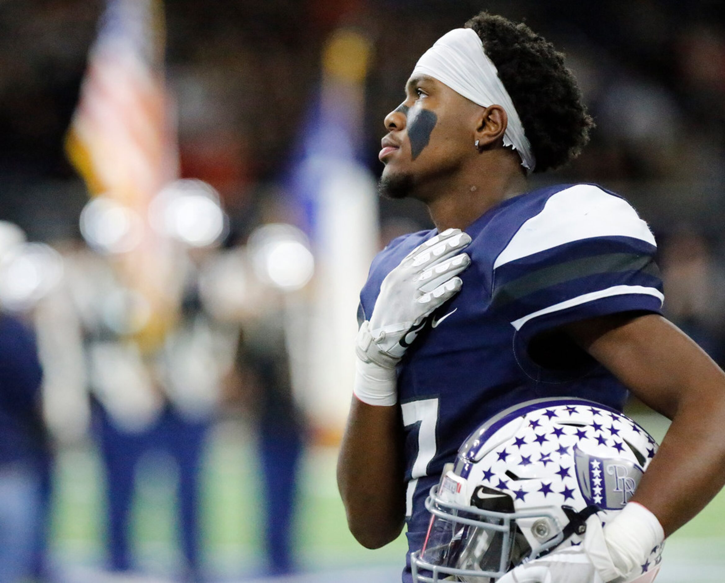 Richland High School wide receiver Shamar Johnson (7) stands at attention during the...