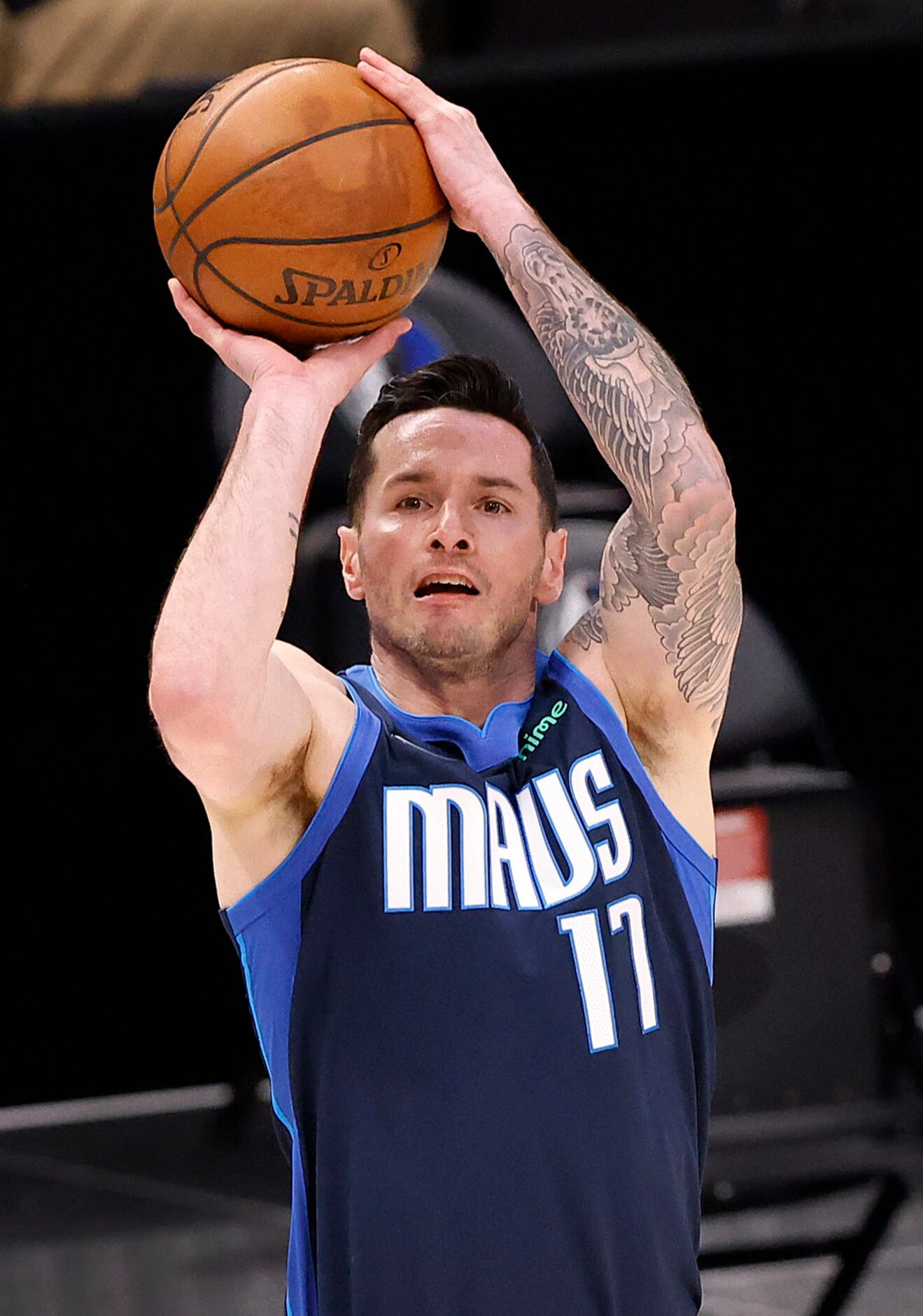 Dallas Mavericks guard JJ Redick (17) puts up and makes a three-pointer against the Detroit...