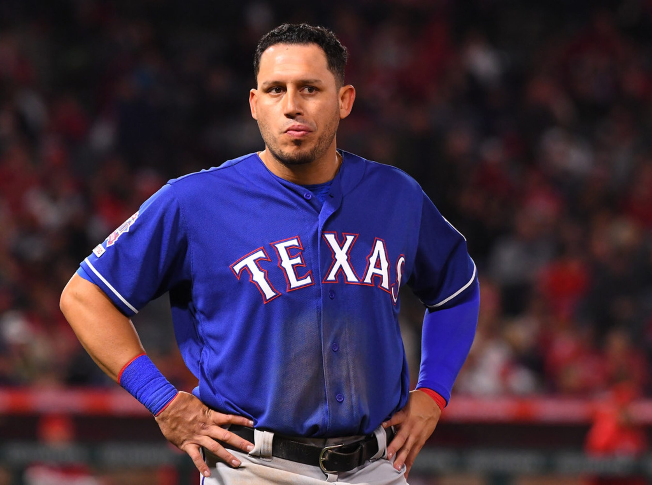 ANAHEIM, CA - MAY 25: Asdrubal Cabrera #14 of the Texas Rangers grimaces after grounding out...