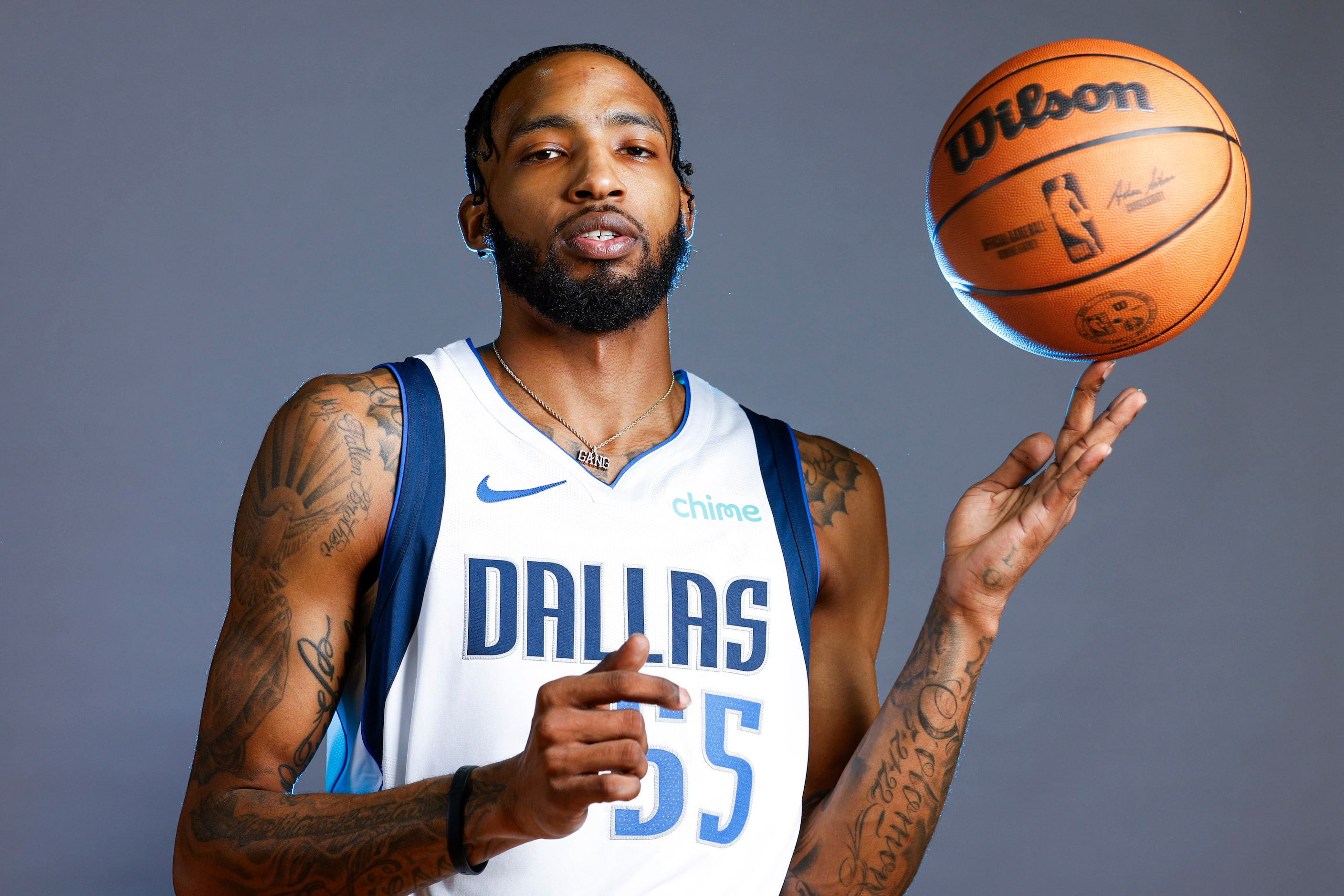 Dallas Mavericks’ Derrick Jones Jr. poses for a photo during the media day on Friday, Sept....