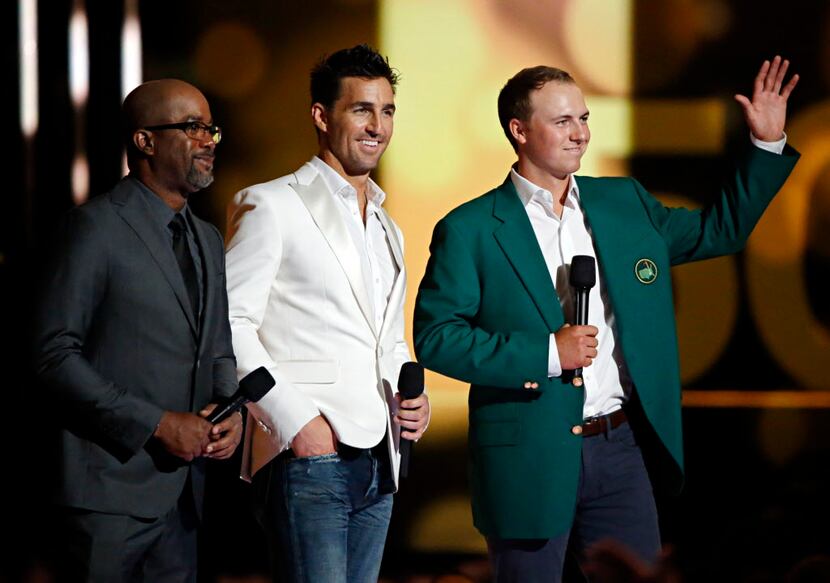 (From left) Darius Rucker, Jake Owen and Jordan Spieth appear on stage during the 2015...