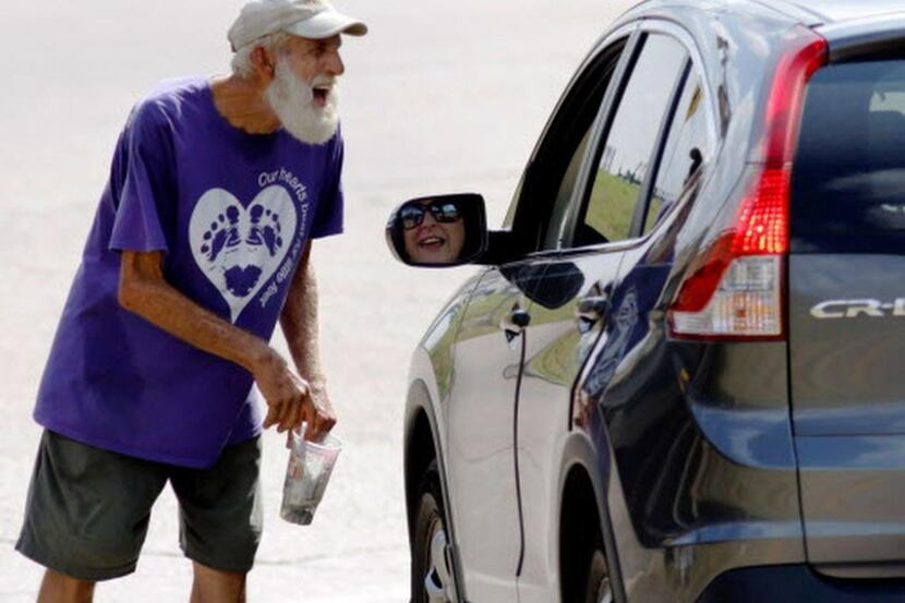 
A panhandler worked a Dallas intersection last September.

