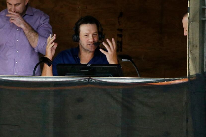 Former Dallas Cowboys player Tony Romo in the booth with Jim Nantz during the second half of...