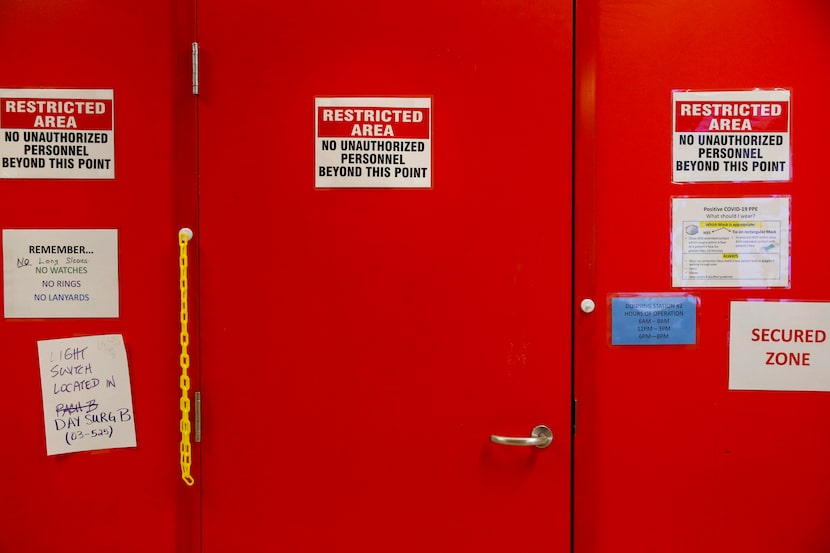 Just on the other side of this door, painted red as a warning of the highly contagious...