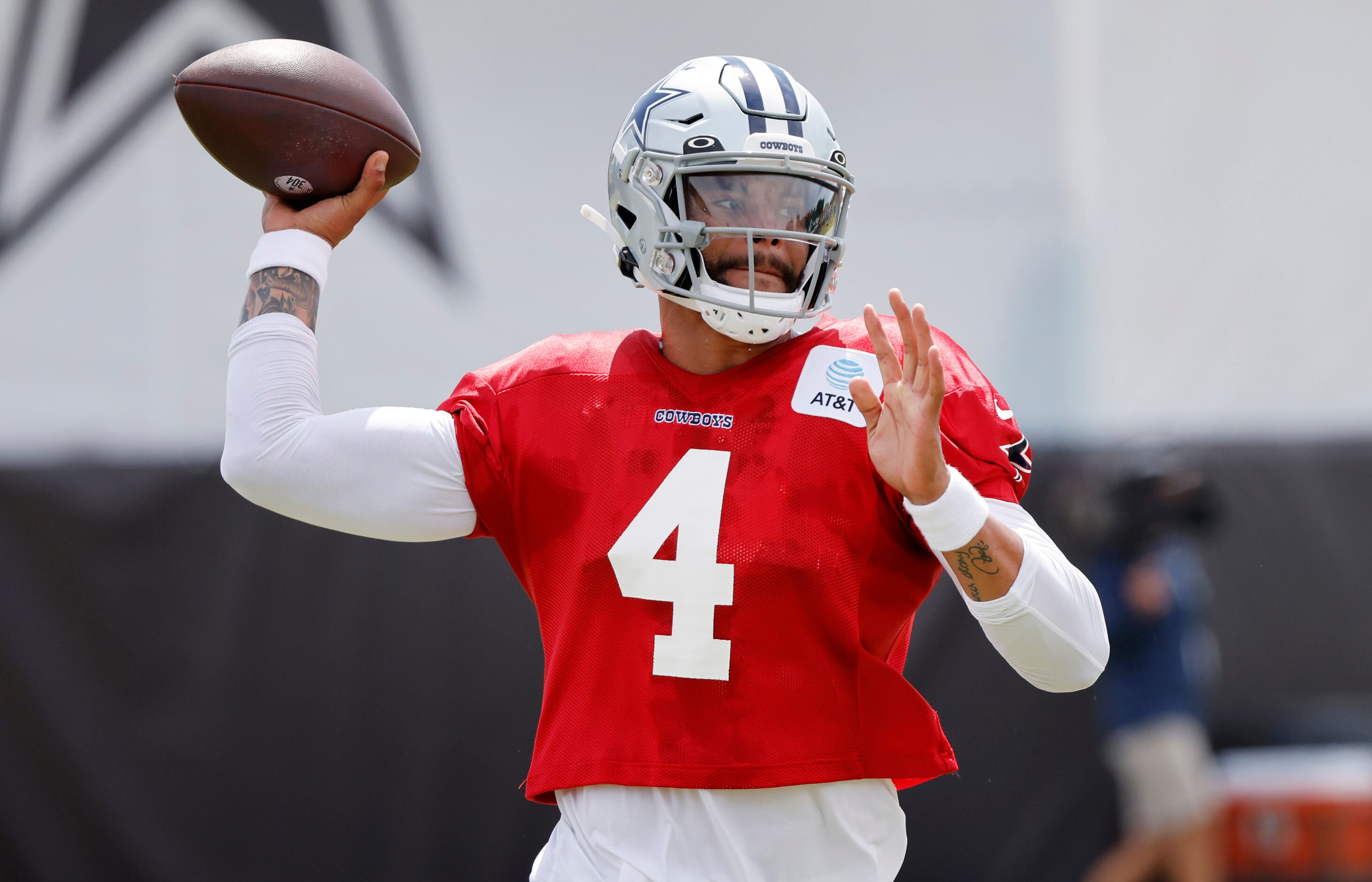 Dallas Cowboys quarterback Dak Prescott (4) throws  during training camp practice passing...