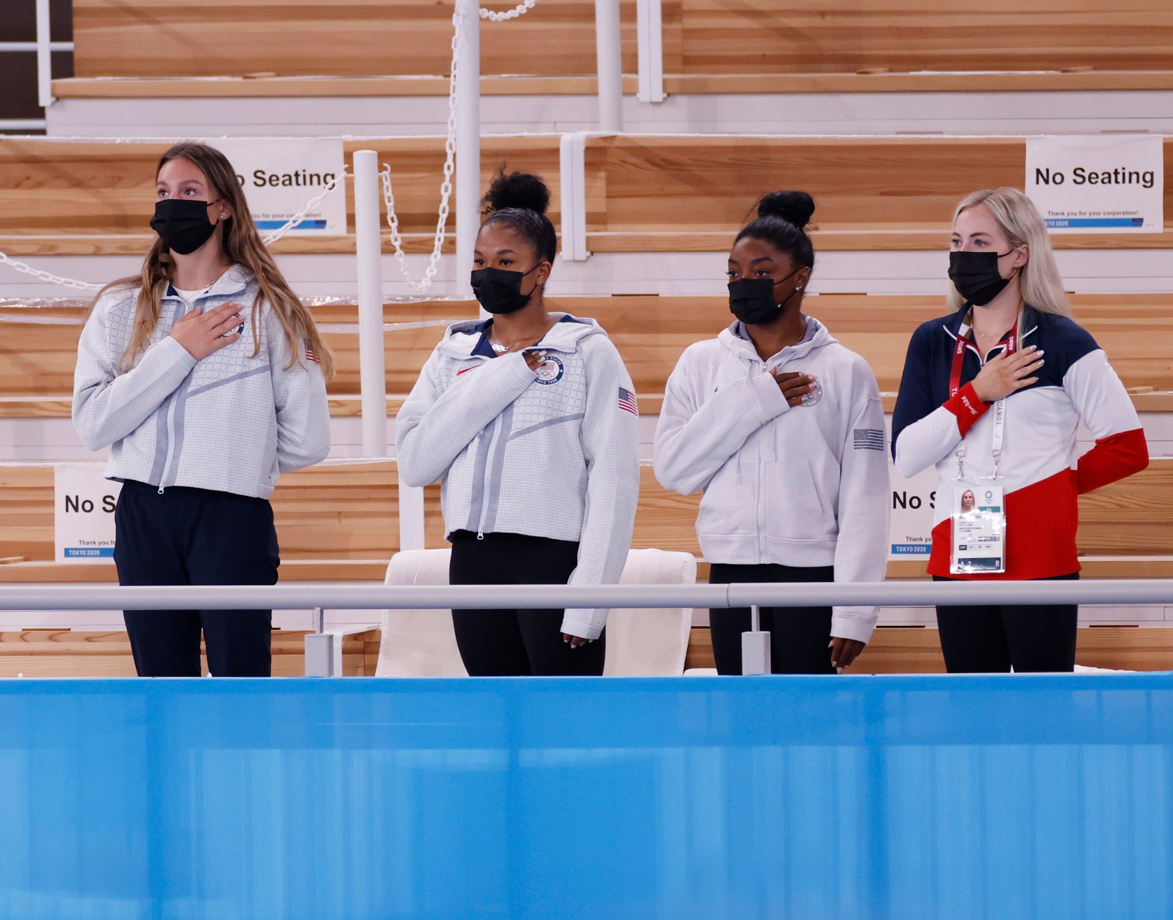 (From l to r) USA’s Grace McCallum, Jordan Chiles, Simone Biles, and MyKayla Skinner stand...
