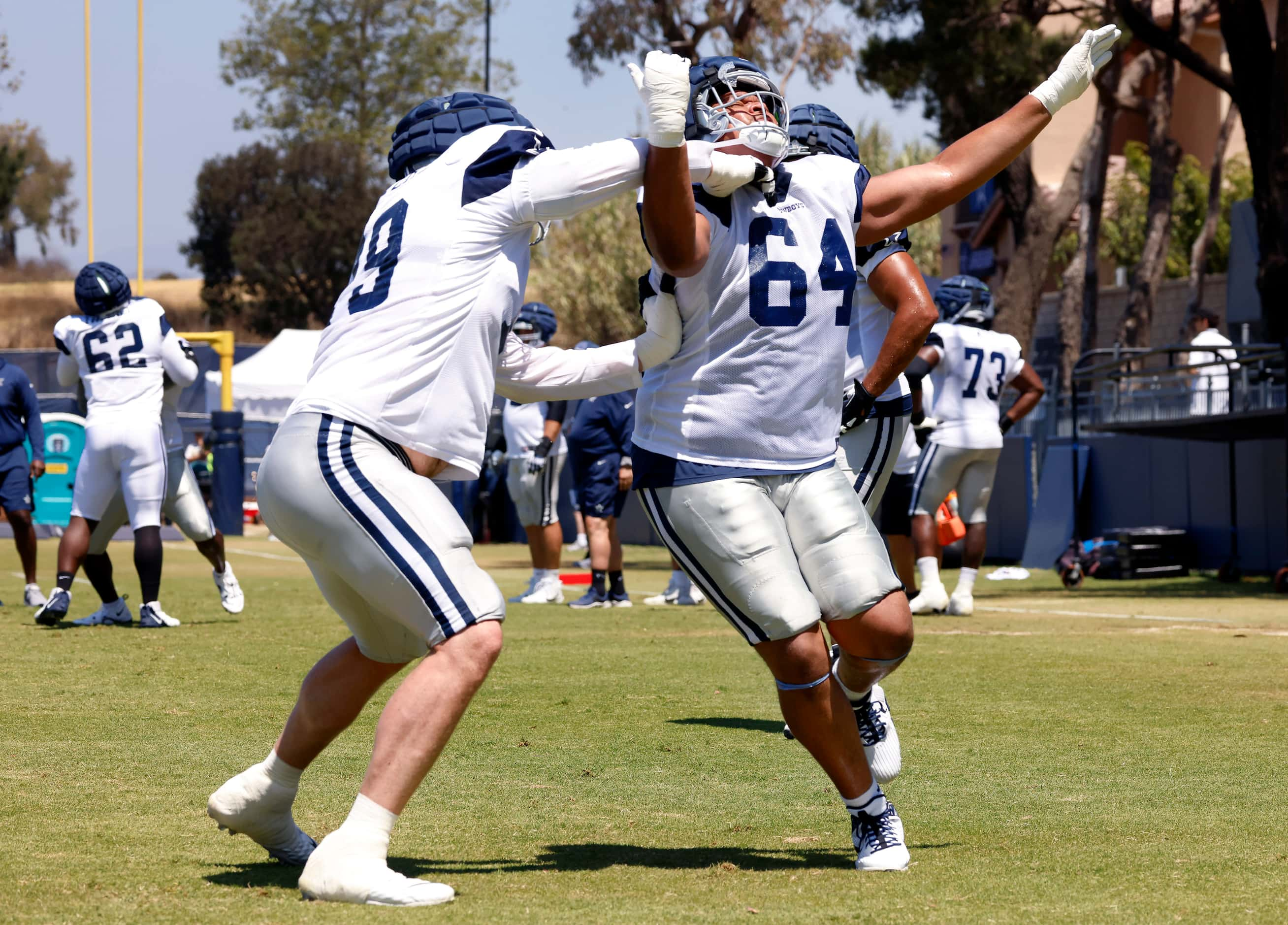 Dallas Cowboys offensive tackle Earl Bostick Jr. (64) Dallas Cowboys offensive tackle Matt...