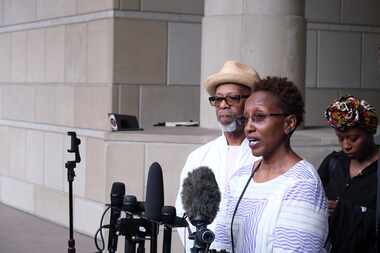 Anthony Johnson Jr's mother, Jacqualyne, speaks outside the Tim Curry Criminal Justice...
