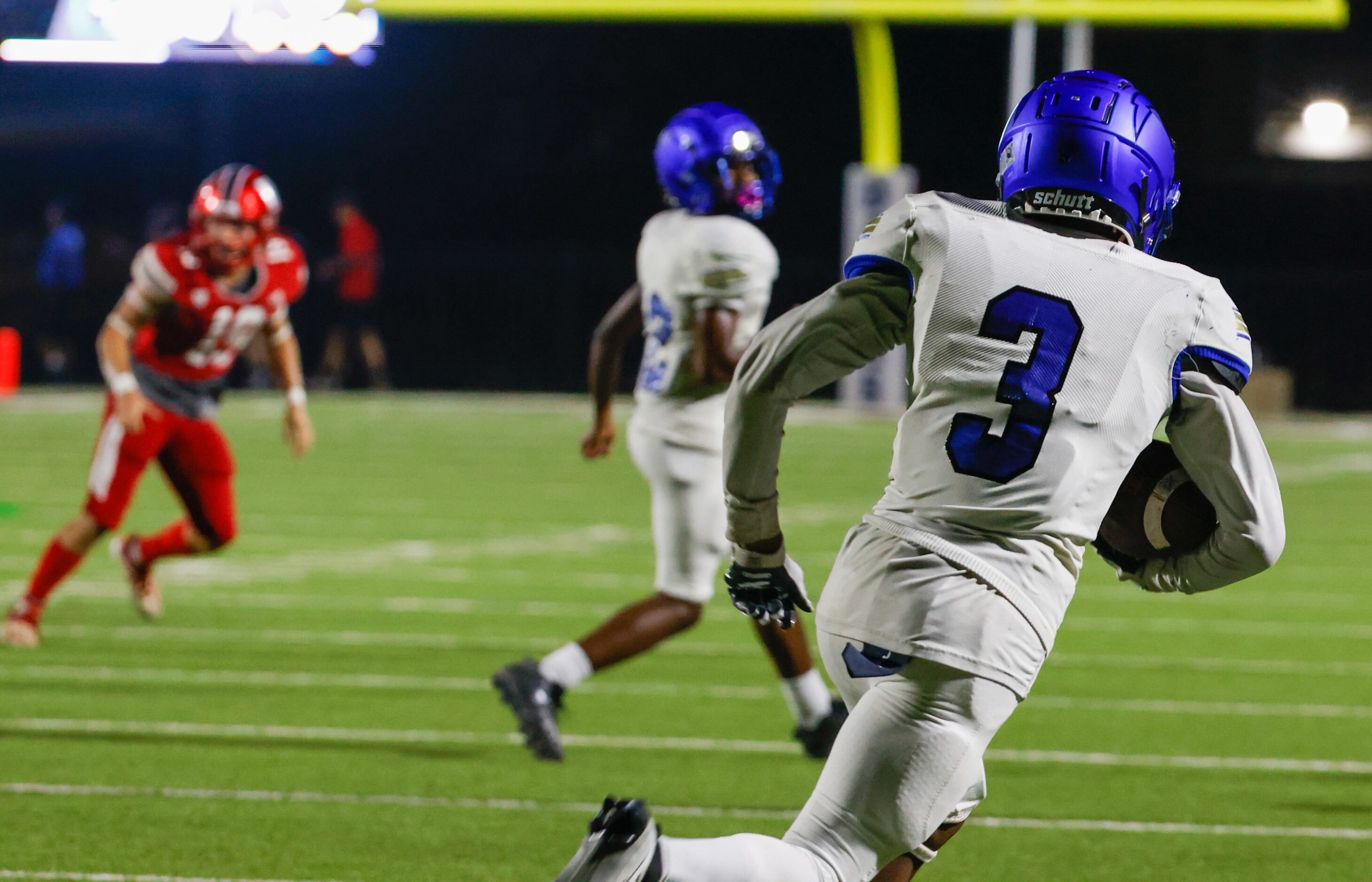 Conrad wide receiver DeAnthony Flagge (3) carries the ball down field during the second half...