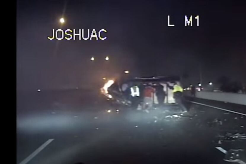 A group of cops and civilians work to rescue a 70-year-old man from a burning vehicle...