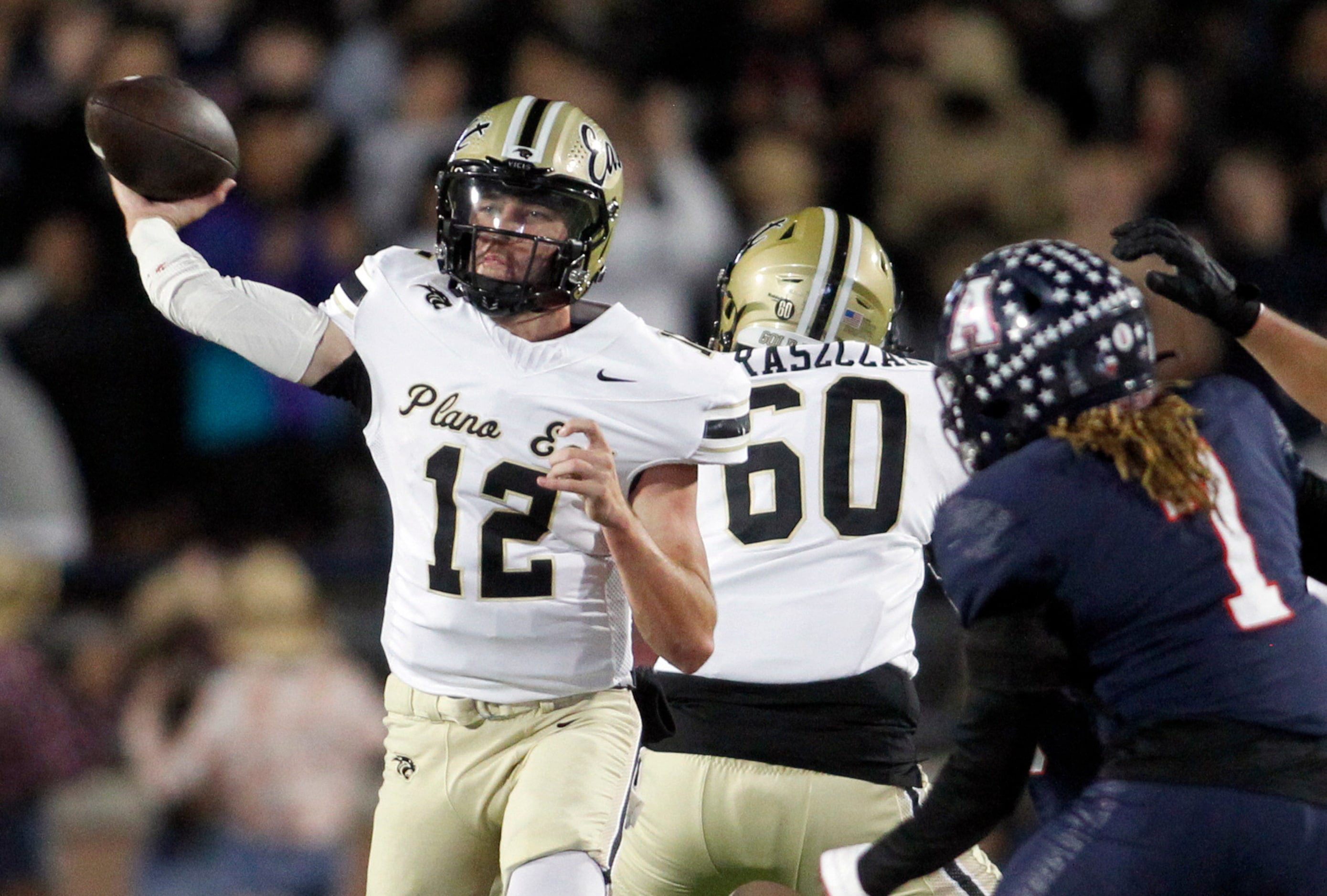 Plano East quarterback Jackson Hays (12) delivers a pass downfield as he is pressured by...