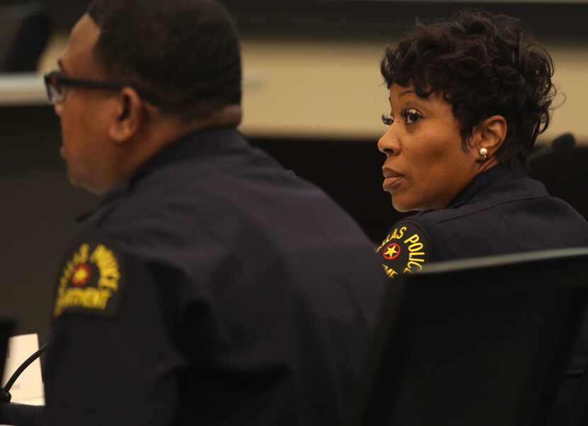 Dallas Police Chief U. Renee Hall looks over to Lt. David Davis as he presents an overview...