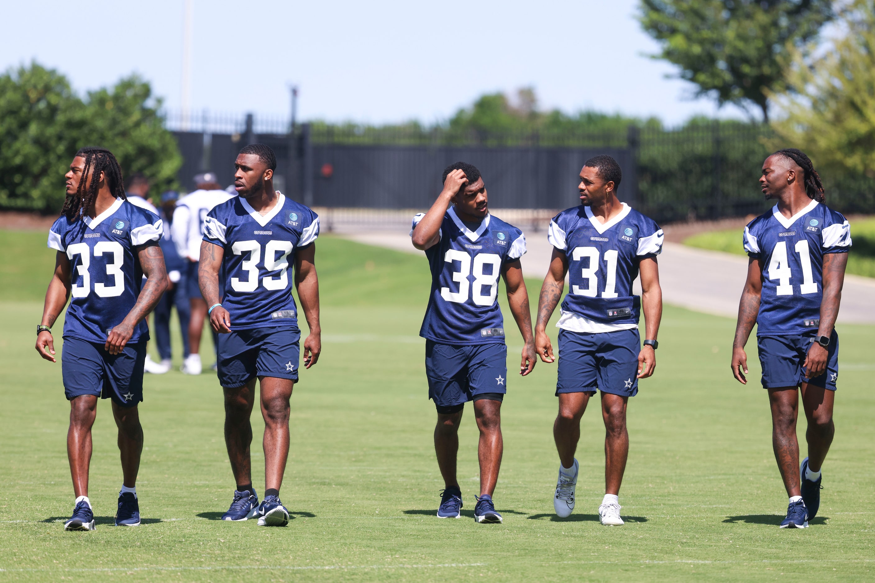 Dallas Cowboys defensive backs Julius Wood (33), Emany Johnson (39), Josh DeBerry (38), Josh...