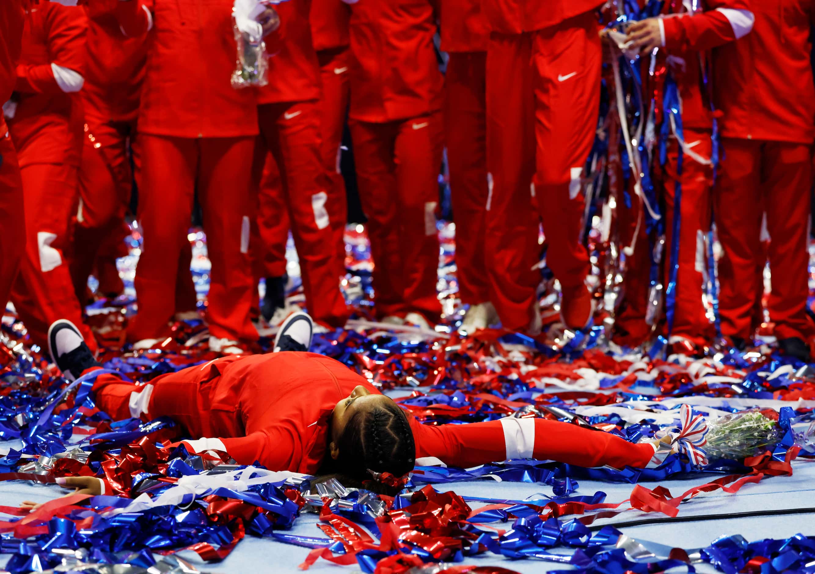 Jordan Chiles celebrates in the streamers after the women's U.S. Olympic gymnastics team was...