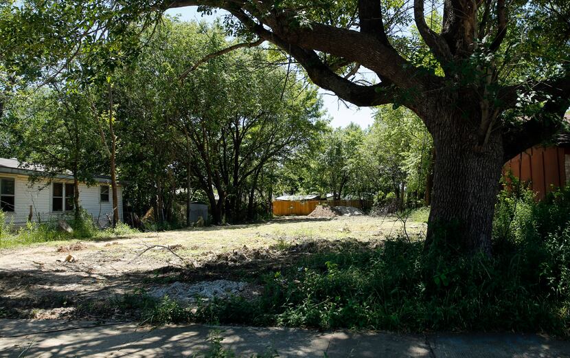 An empty lot is all that remains at 3514 McBroom St. in West Dallas, after Michael Tilley...