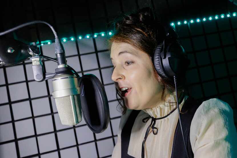 Julie Shields, voice actor, poses in her sound booth at her home in McKinney, TX on Thursday...