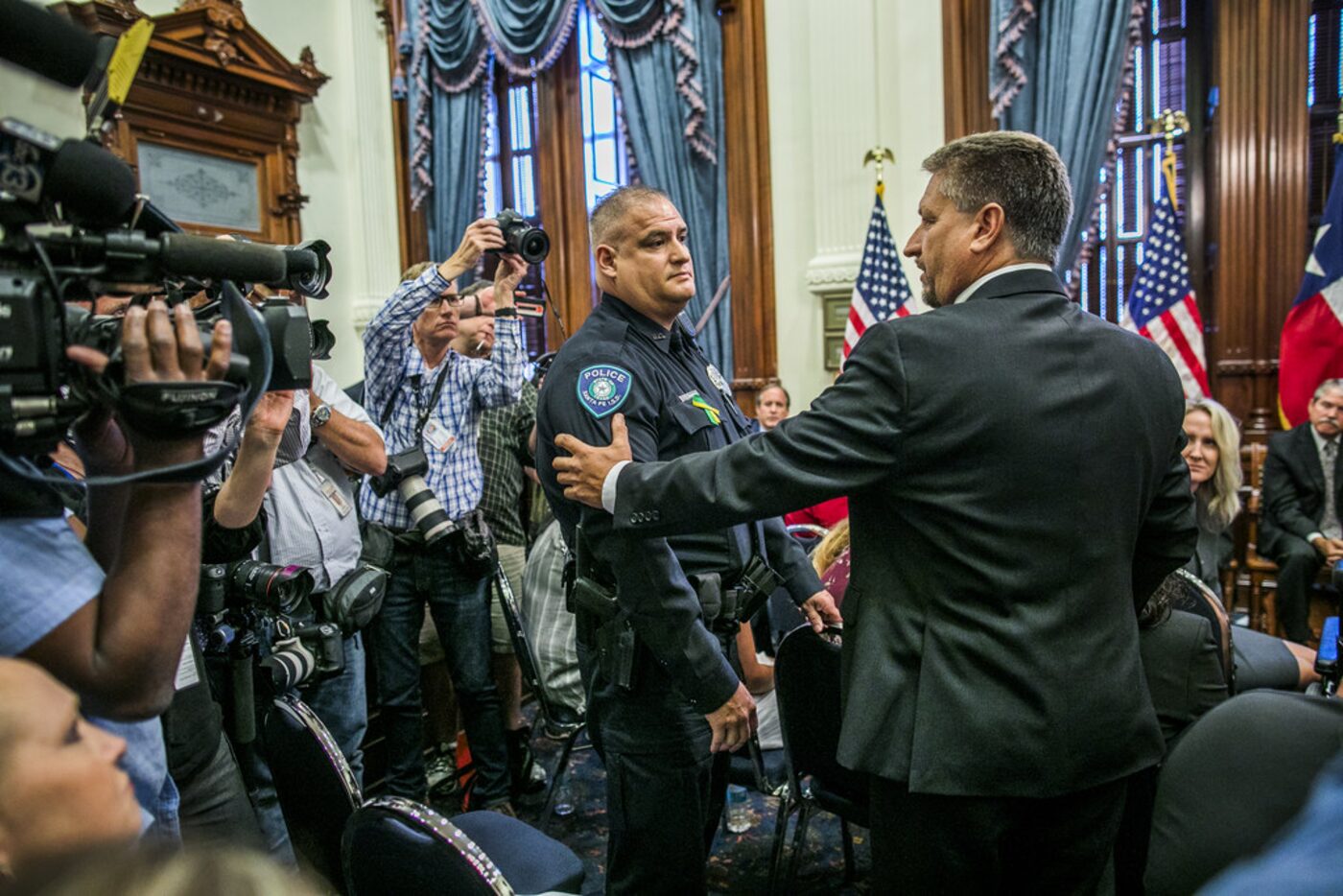 Scot Rice (right) credits police officer Johnny Banda with saving his wife, Flo , during...