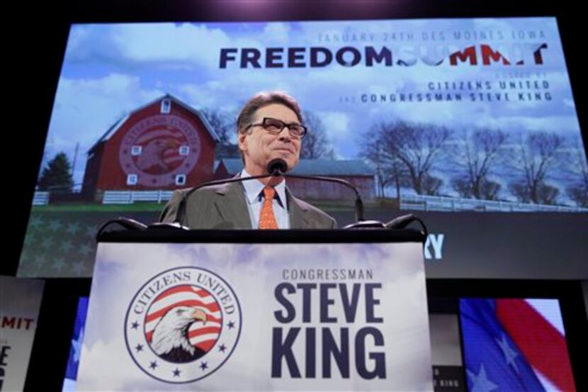  Former Texas Gov. Rick Perry speaks during the Freedom Summit, Saturday, Jan. 24, 2015, in...