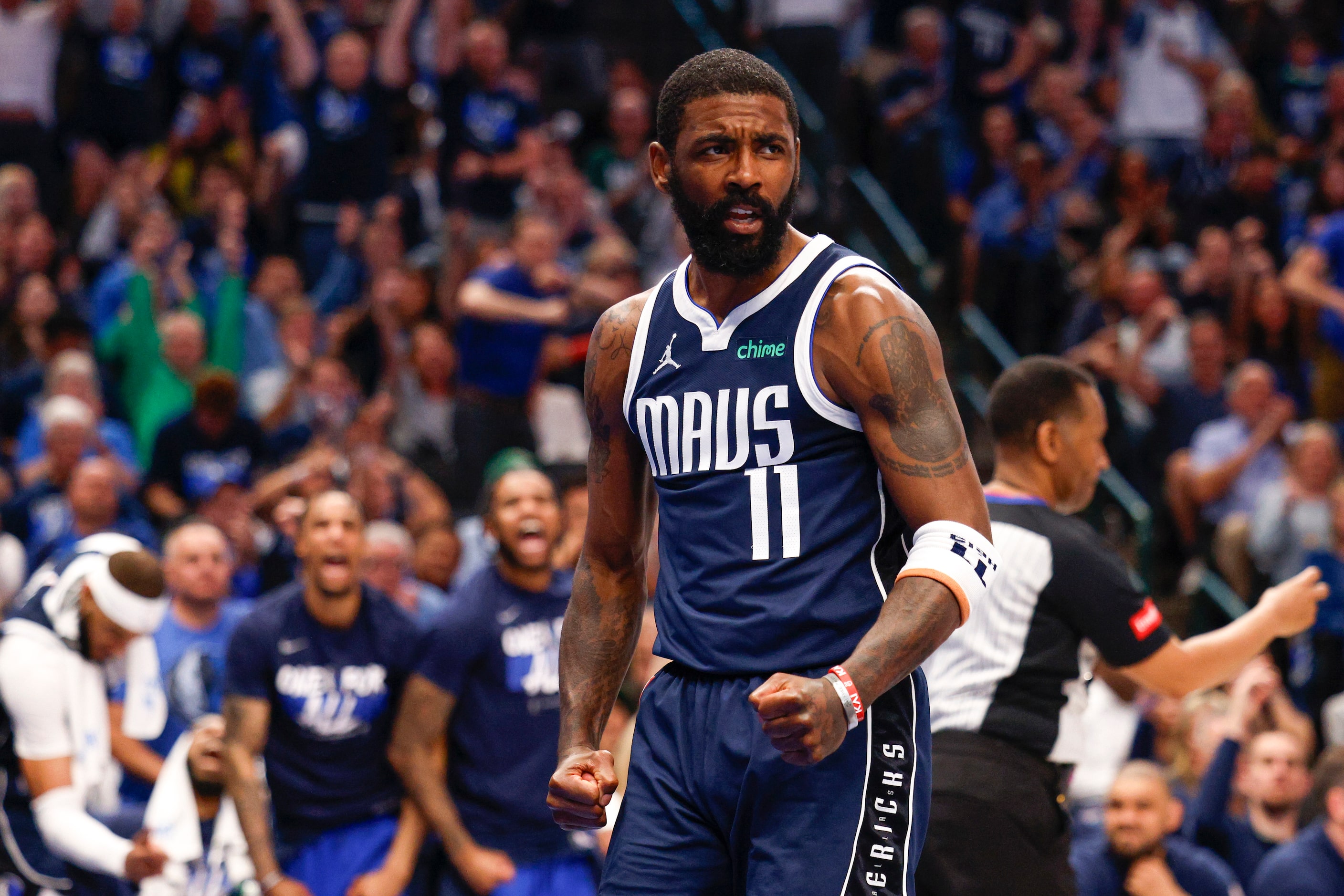 Dallas Mavericks guard Kyrie Irving (11) reacts alongside LA Clippers guard James Harden (1)...