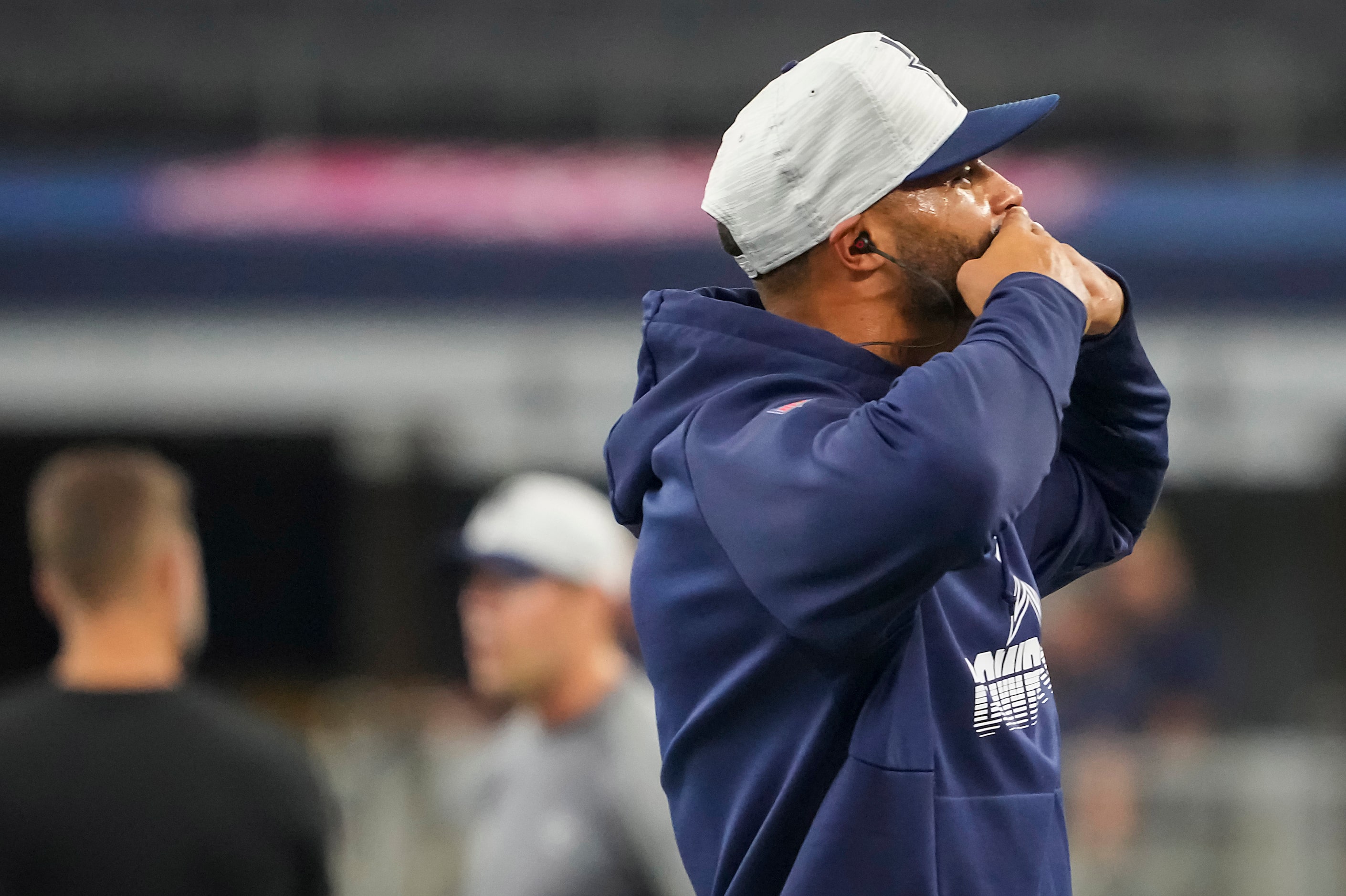 Dallas Cowboys quarterback Dak Prescott blows a kiss to the stands as players warm up before...