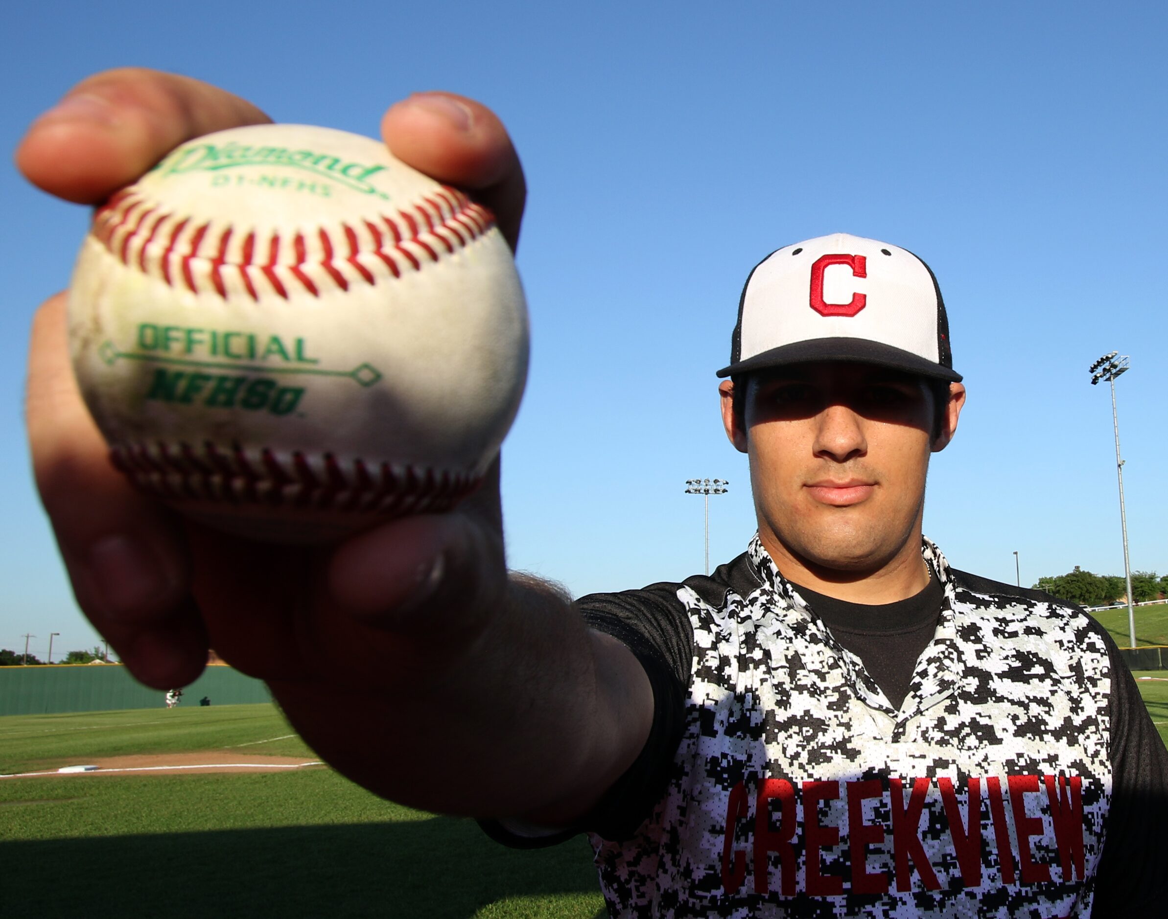 Carrollton Creekview pitcher Brandon White (15) prior to the start of the game against...