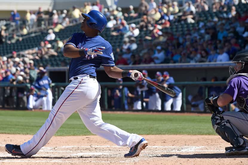 SURPRISE, AZ - MARCH 07:  Adrian Beltre #29 of the Texas Rangers bats against the Colorado...