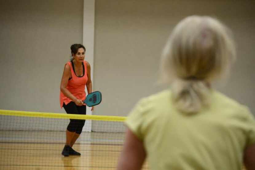 
Sharon Redd plays pickleball at the Rowlett Community Centre. Pickleball, played by...