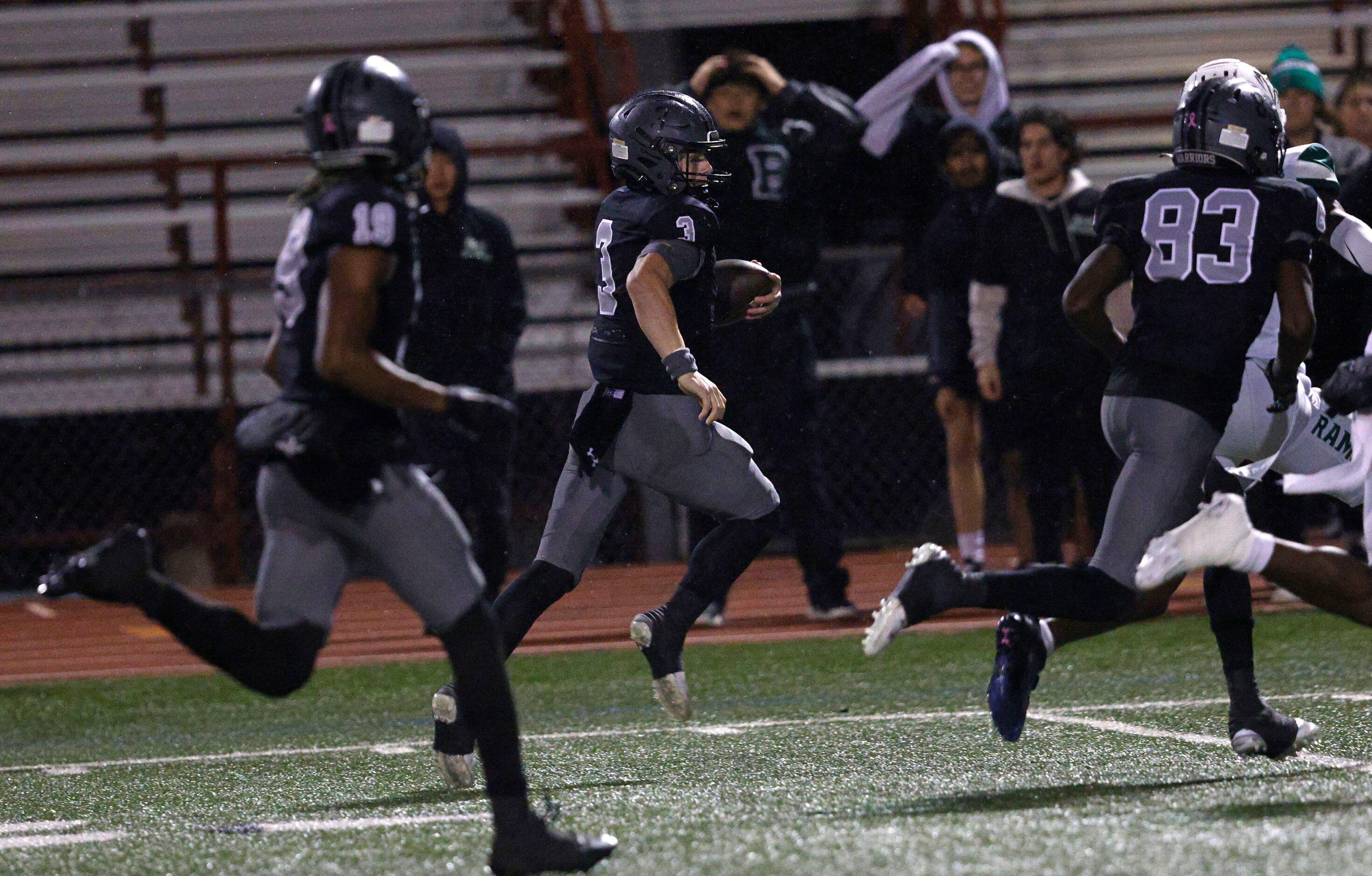 Martin's Brooks Brigand (3) runs into the end zone for a touchdown during the first half of...