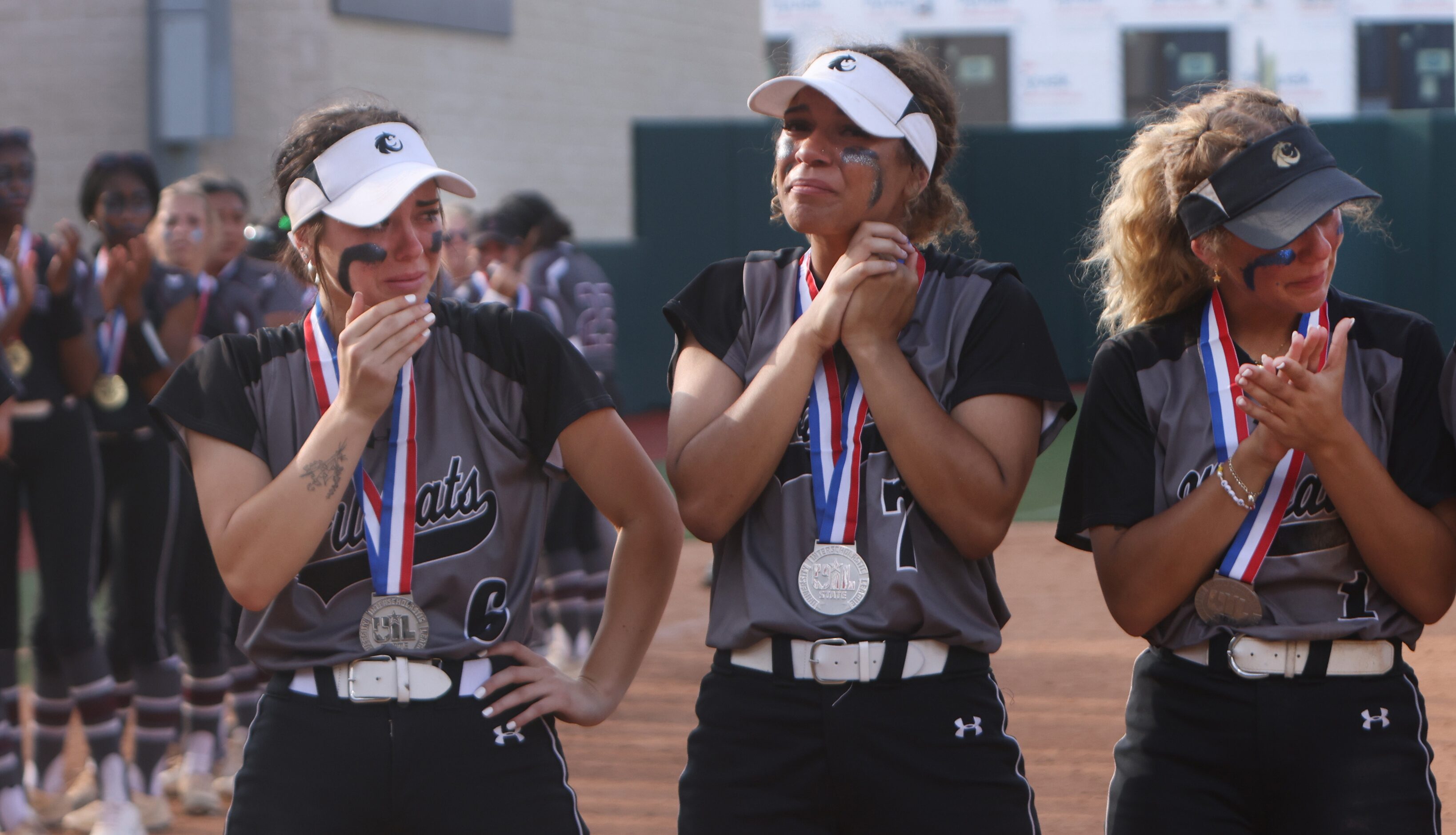 Denton Guyer players Kaylynn Jones (6), Tehya Pitts (7), and Avery Jefferson (1) feel the...