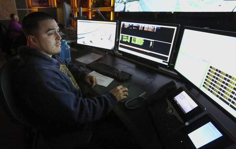 
Jncarlo Camacho mans monitors at the North Texas Tollway Authority’s new nerve center,...