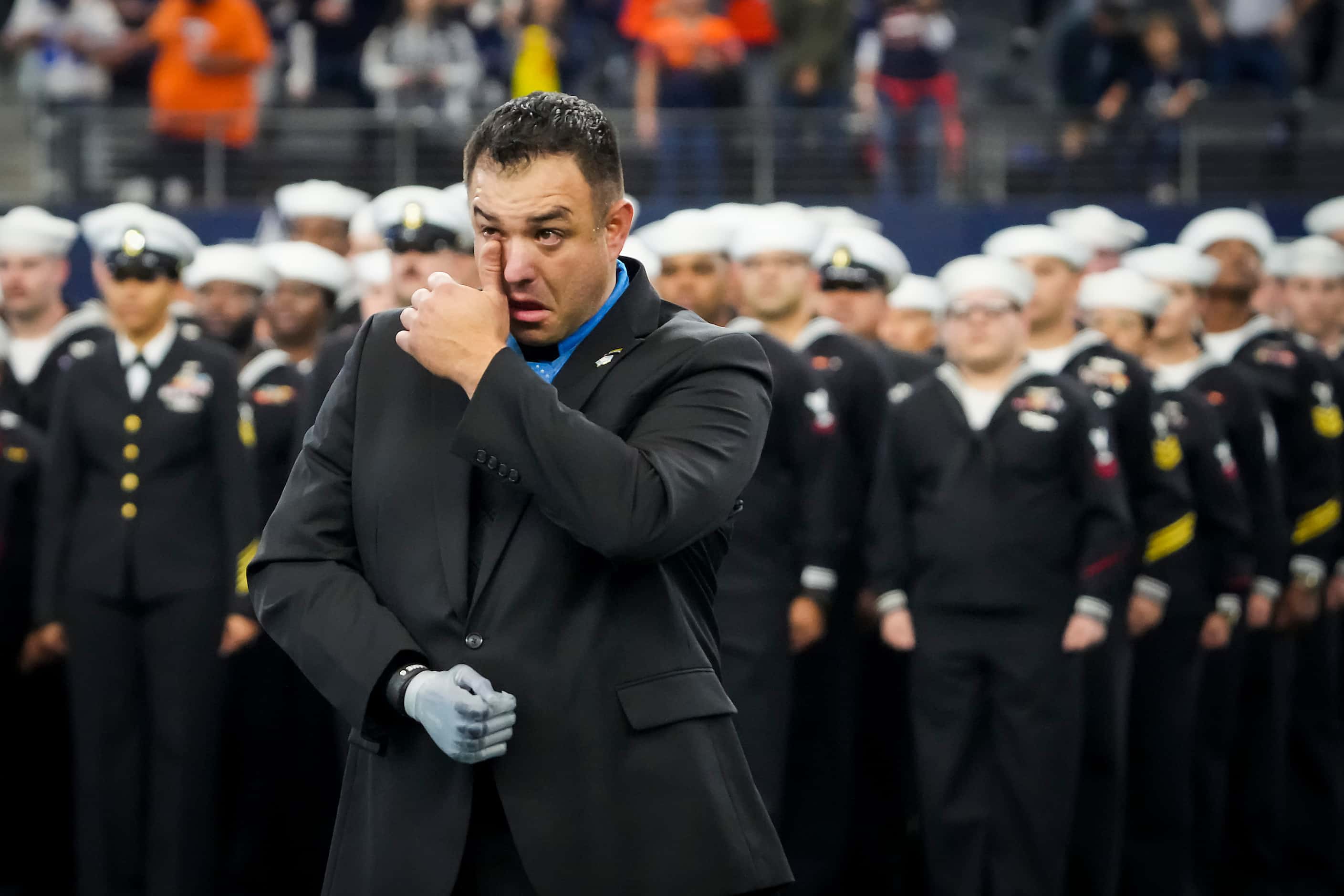 Medal of Honor recipient U.S. Army Master Sergeant Major Leroy Petry wipes away a tear as...