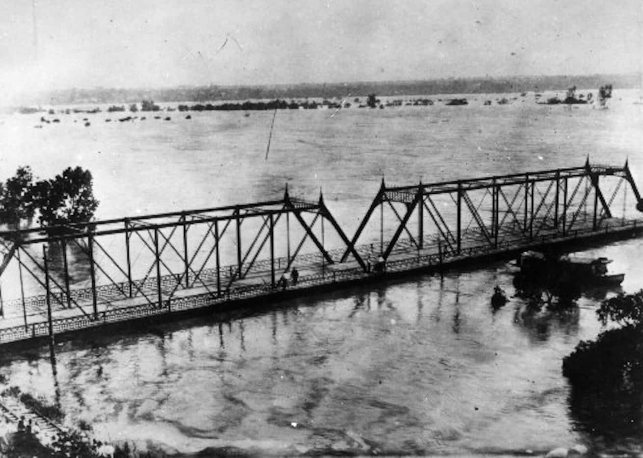 A flood in 1908 destroyed all the bridges between Dallas and Oak Cliff and left 4,000 people...