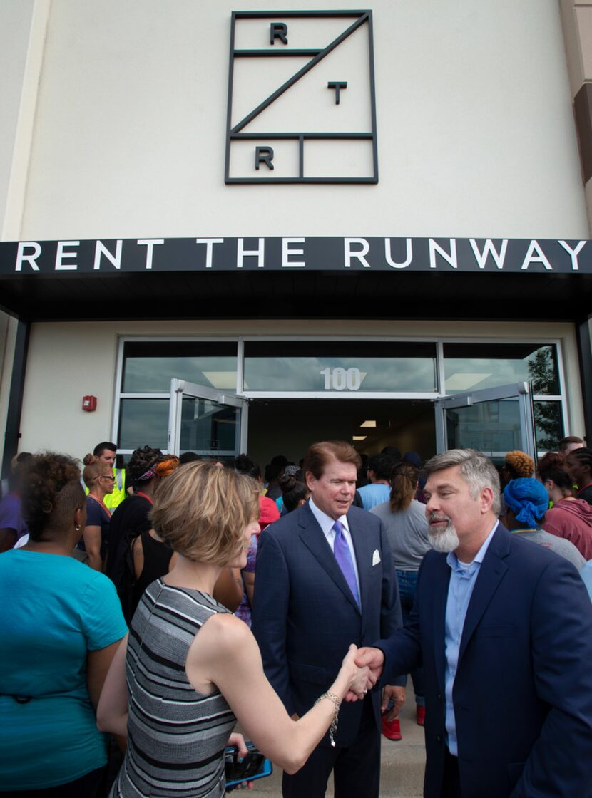 Arlington Mayor Pro-Tem Victoria Farrar-Myers, left, shakes hands with Rent The Runway chief...