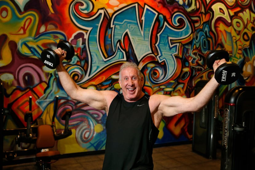 Larry North, in front of a graffiti wall at his new gym in Preston Center, hopes to attract...