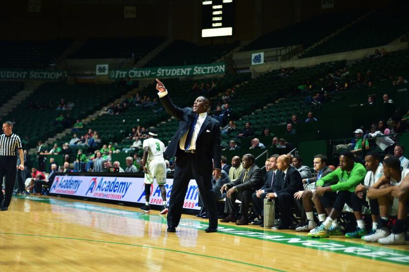North Texas head coach Tony Benford calls out to his players from the sideline against...