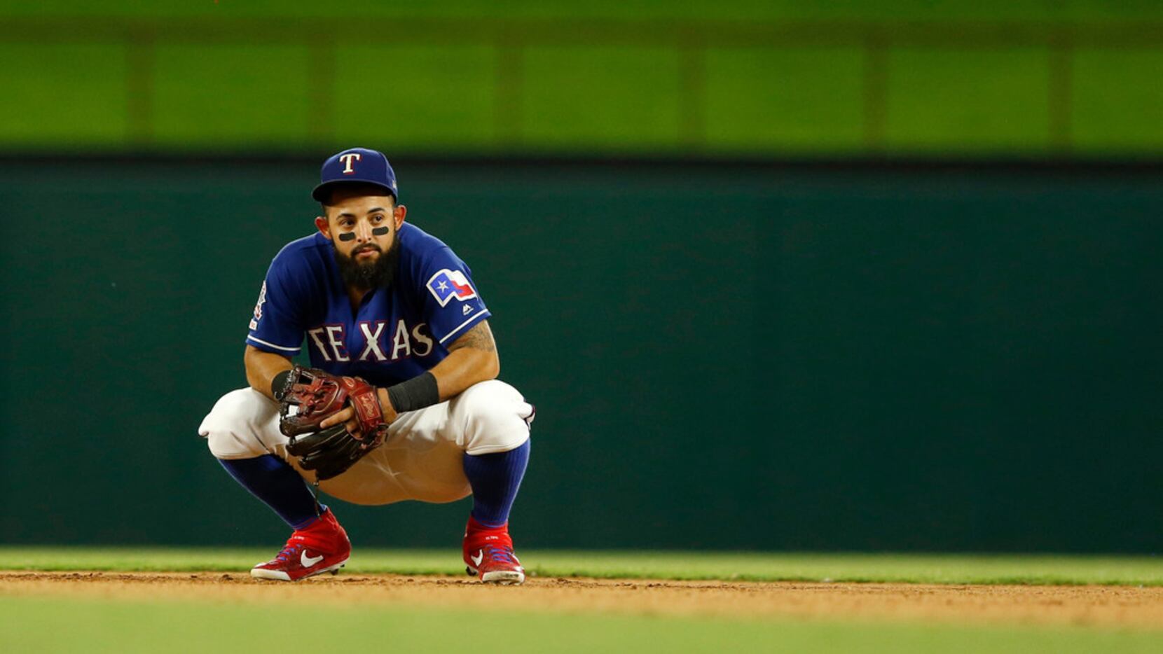 Texas Rangers second baseman Rougned Odor (12) looks toward the dugout during the seventh...