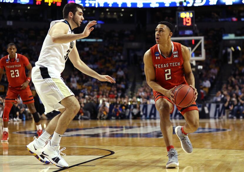 BOSTON, MA - MARCH 23: Zhaire Smith #2 of the Texas Tech Red Raiders is defended by Dakota...