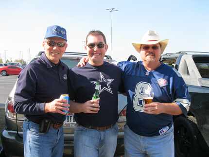 Dan Brown (right) with tailgating partners Larry Stanford and Adam Dornbush.