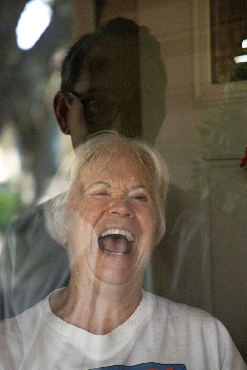 Vickie McDonald shares a laugh with mayoral candidate Scott Griggs as he went door to door...