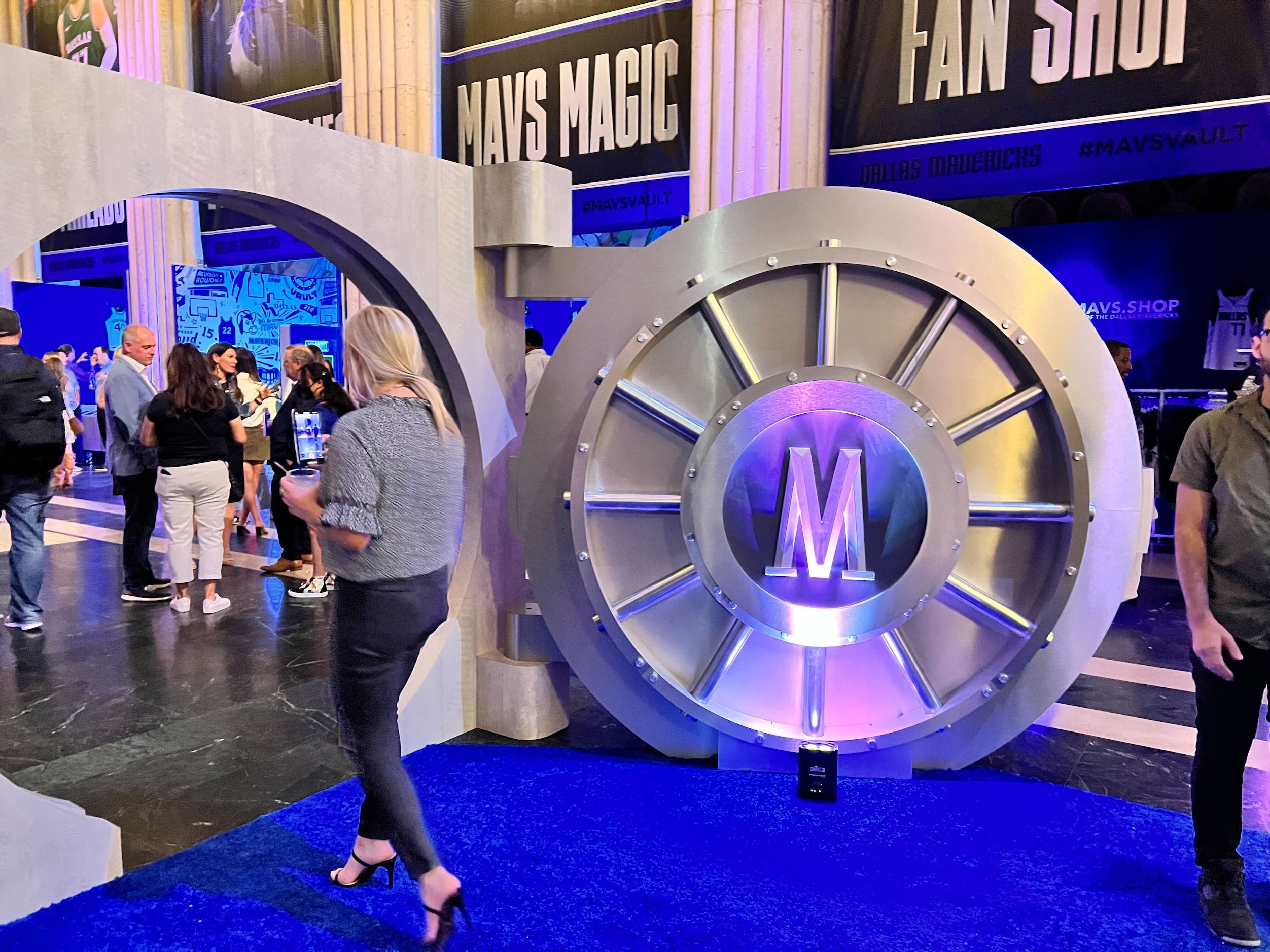 A State Fair attendee enters the Mavs vault exhibit at Fair Park’s Hall of State in Dallas.