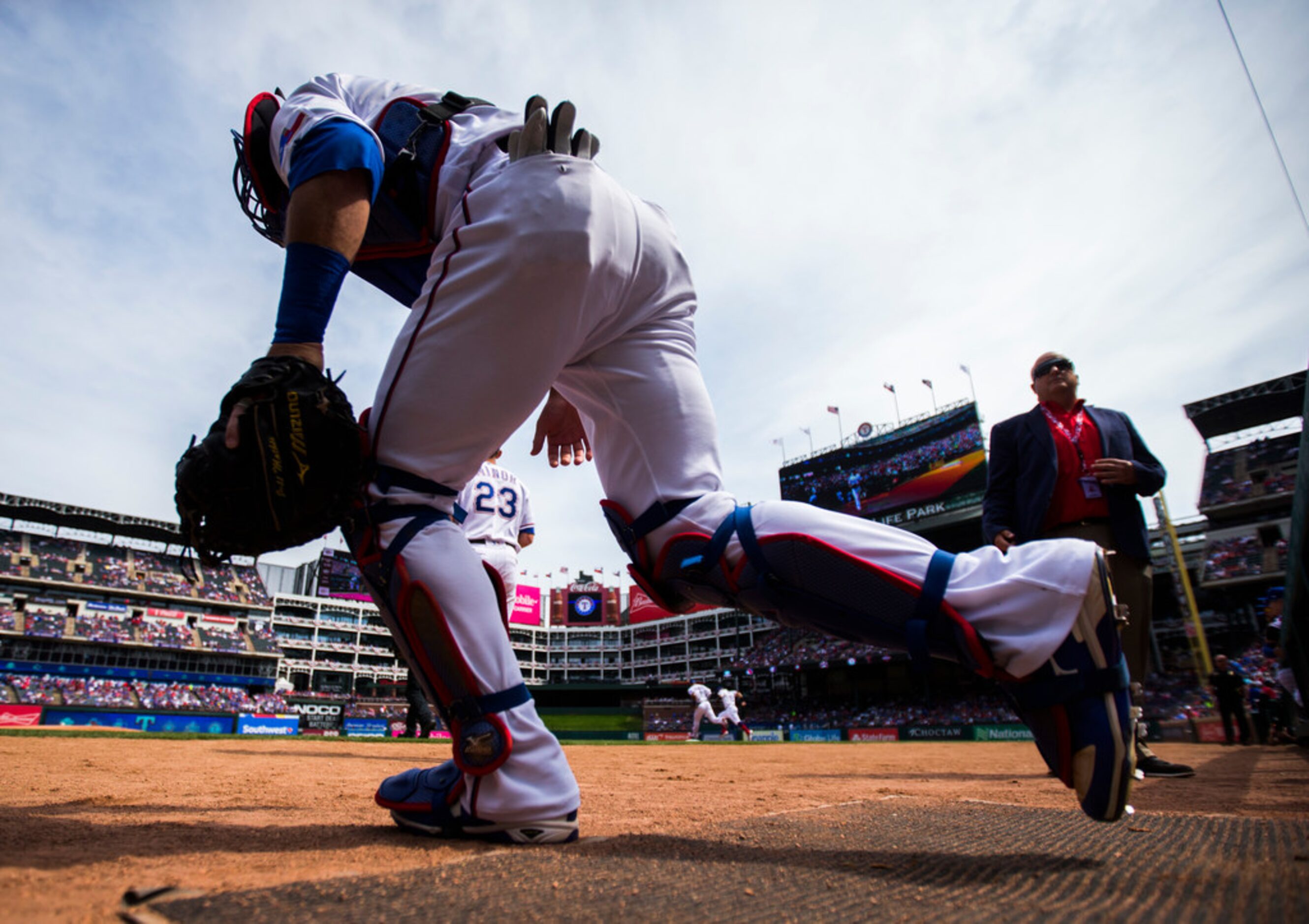 Texas Rangers catcher Jeff Mathis (2) enters the field before an opening day MLB game...