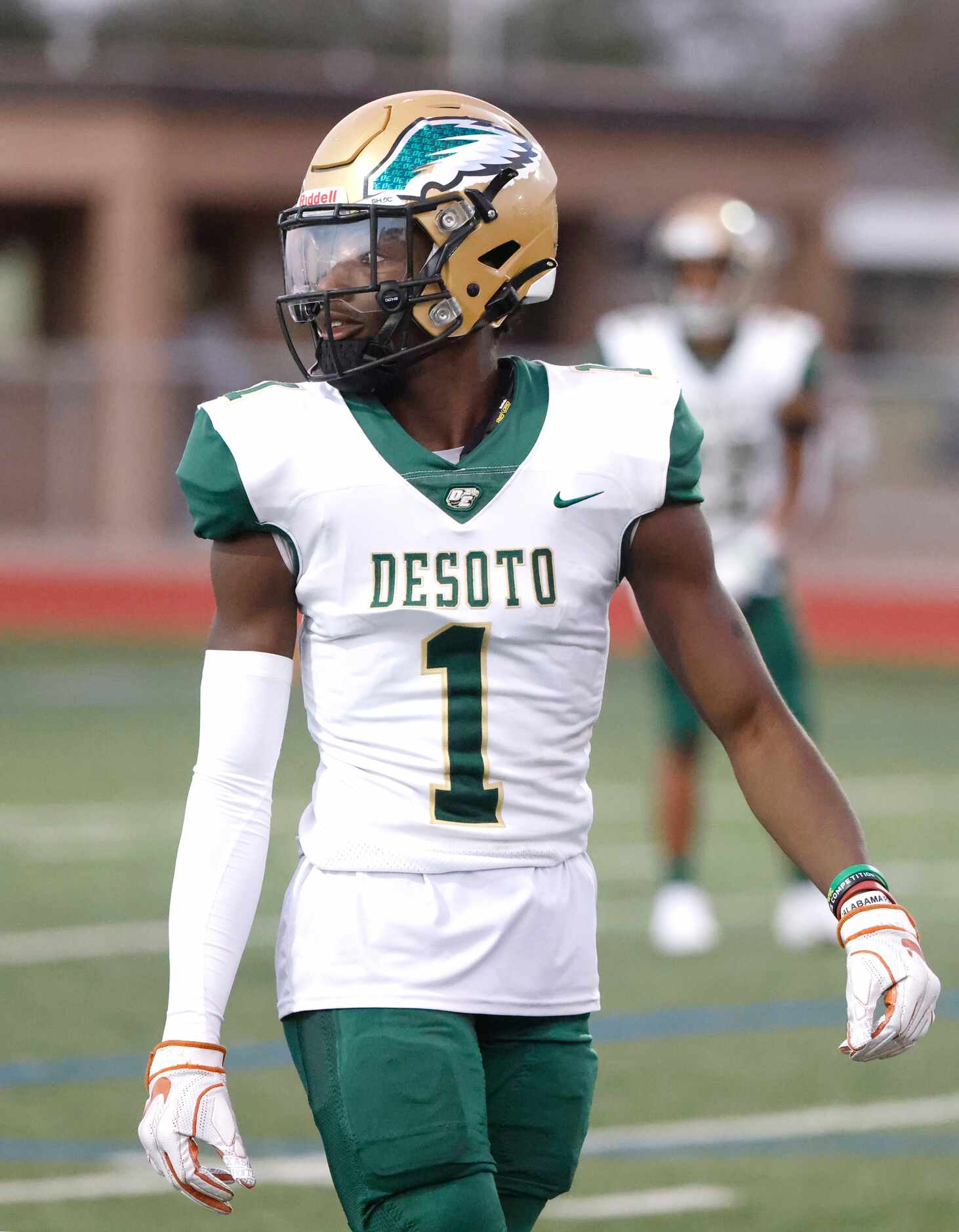 DeSoto wide receiver Johntay Cook II (1) looks on as DeSoto plays Arlington Bowie during the...
