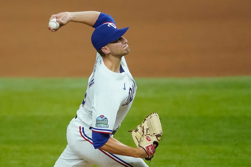 Texas Rangers pitcher Brett Martin delivers during the seventh inning against the Los...