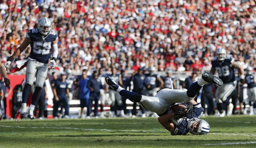 Dallas Cowboys strong safety Jeff Heath (38) intercepts a pass from Tampa Bay Buccaneers...