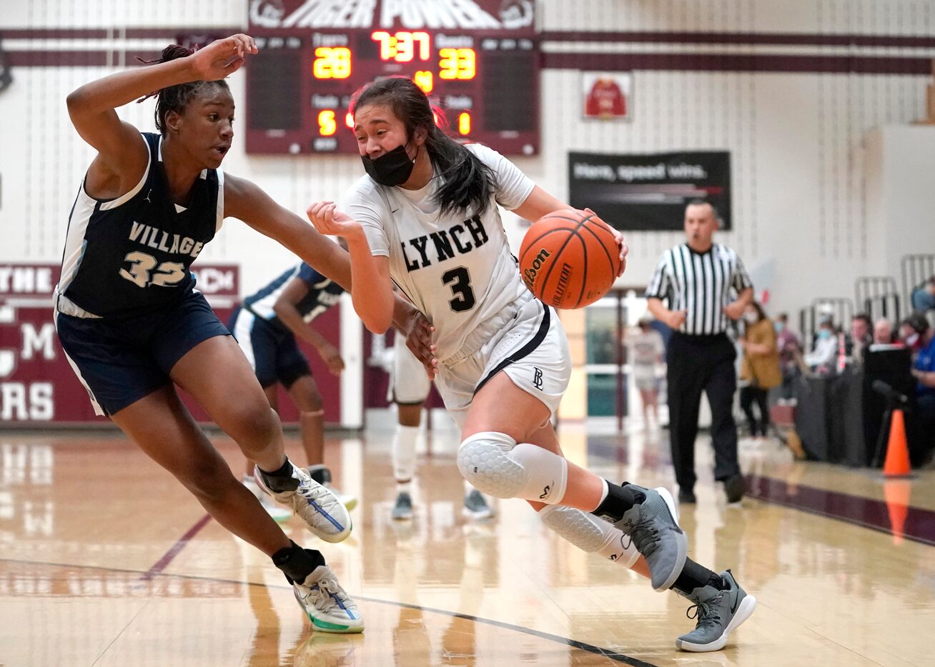 Dallas Bishop Lynch’s Natalie Cardenas (3) drives the lane against The Village School’s...