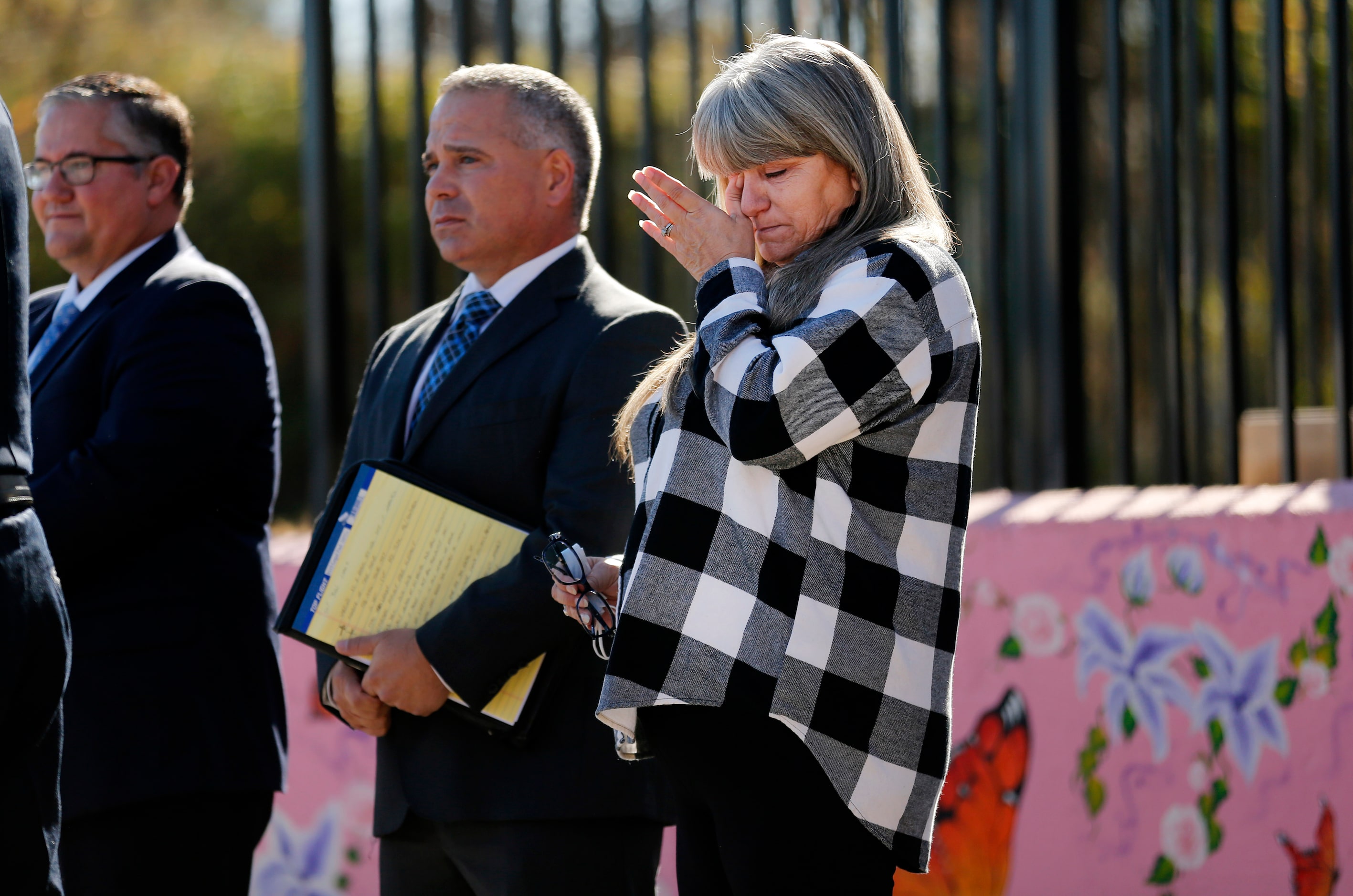 Amber Hagerman's mother Donna Williams wipes away tears after speaking about her daughter...