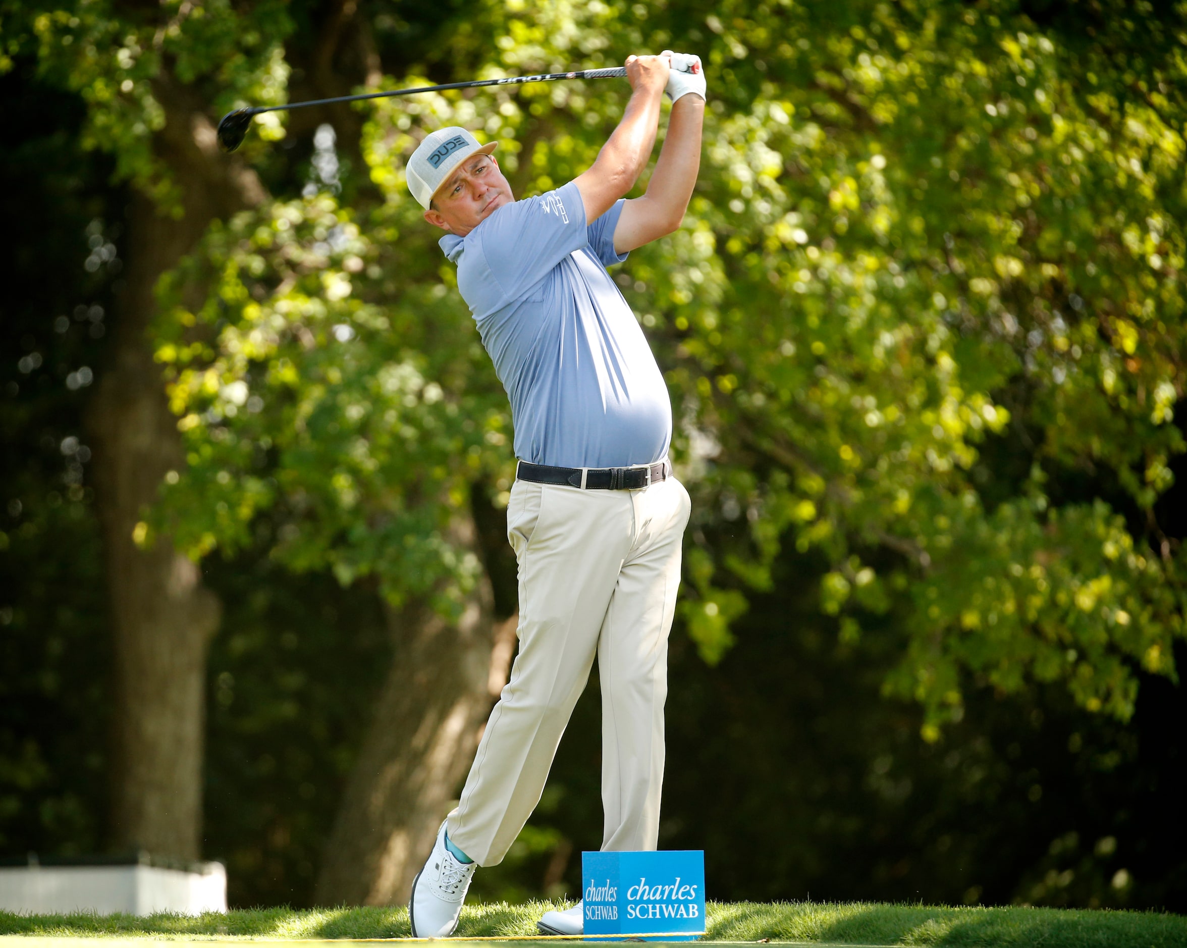 PGA golfer Jason Dufner tees off on No. 9 during the Charles Schwab Challenge practice round...