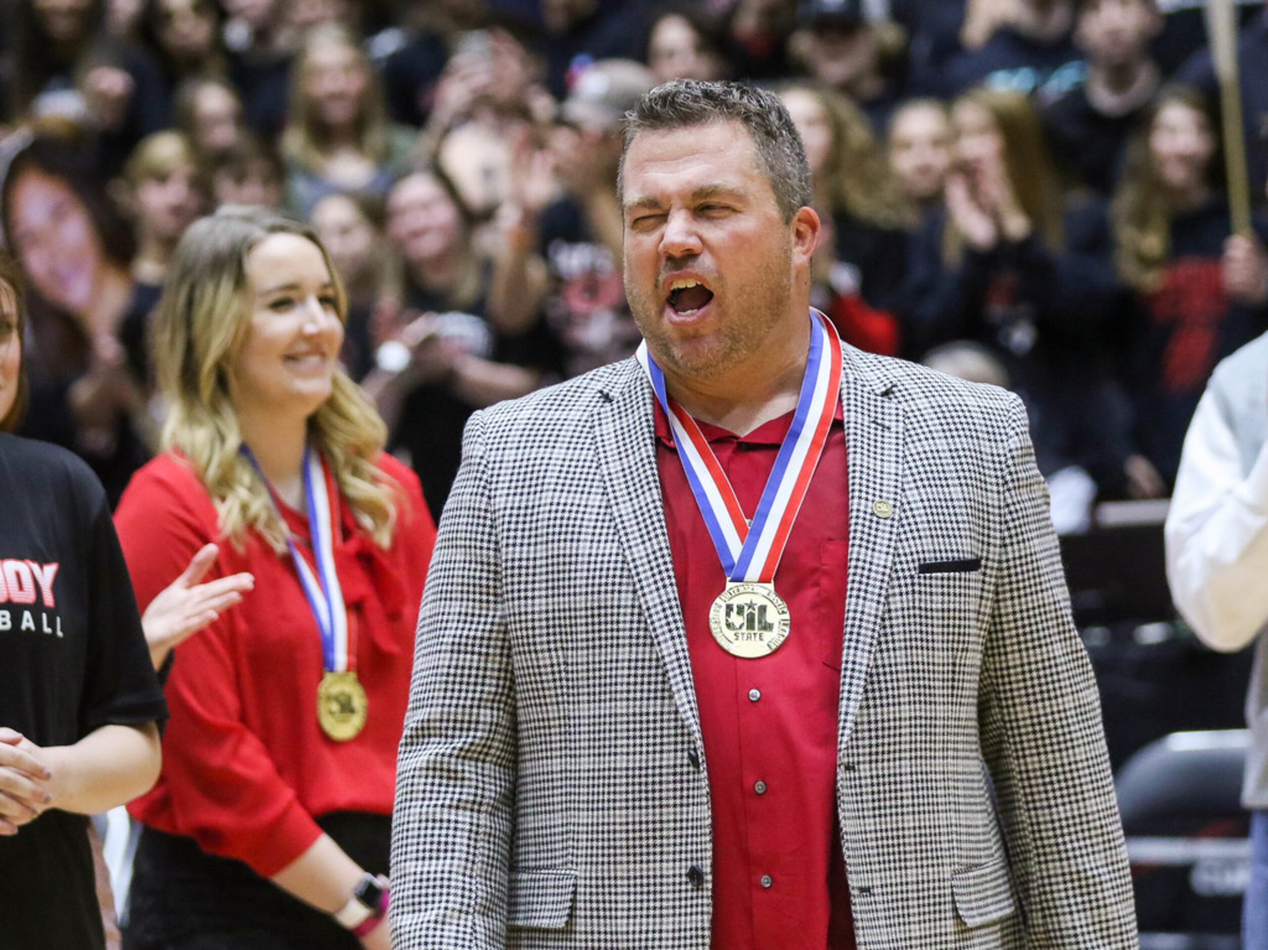 LovejoyÃs coach Ryan Mitchell celebrates after winning a class 5A volleyball state...