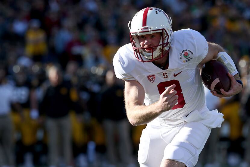 PASADENA, CA - JANUARY 01: Quarterback Kevin Hogan #8 of the Stanford Cardinal runs the ball...
